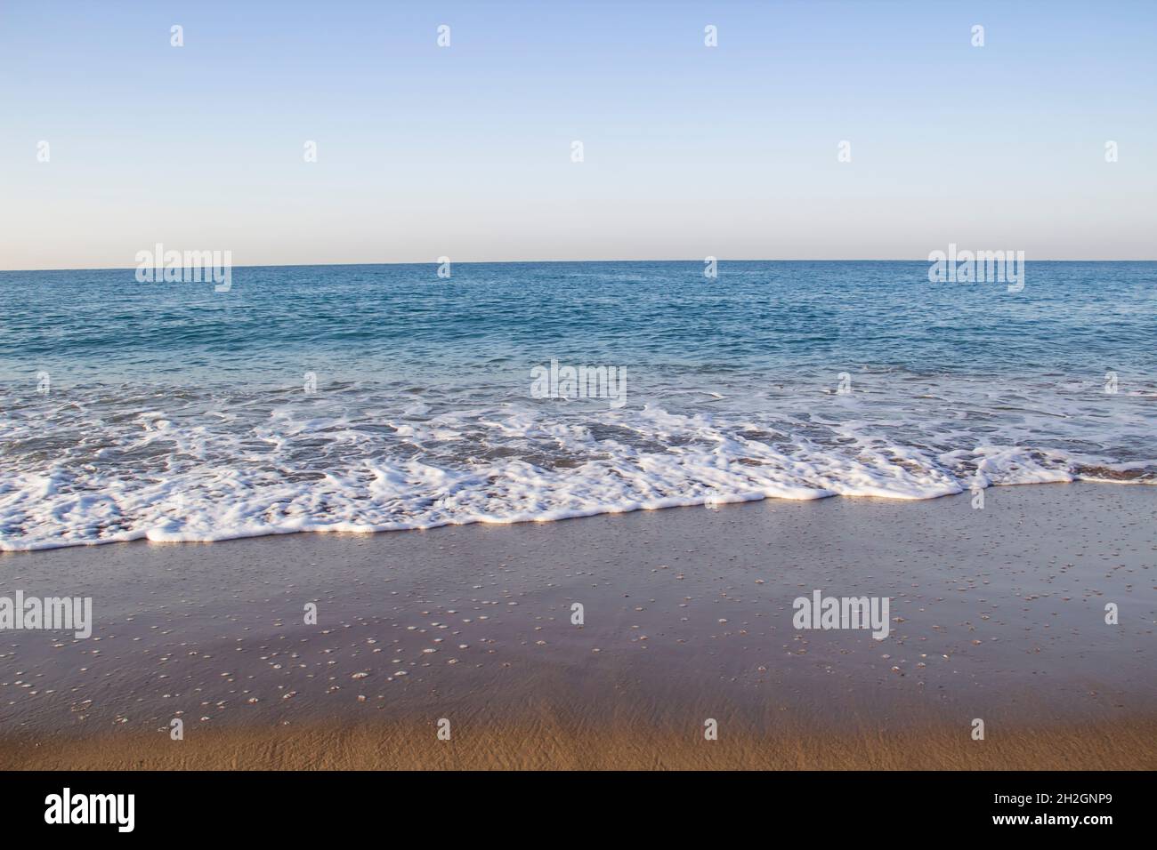 Beautiful seascape with sea waves and sand. Sea waves on the beach ...