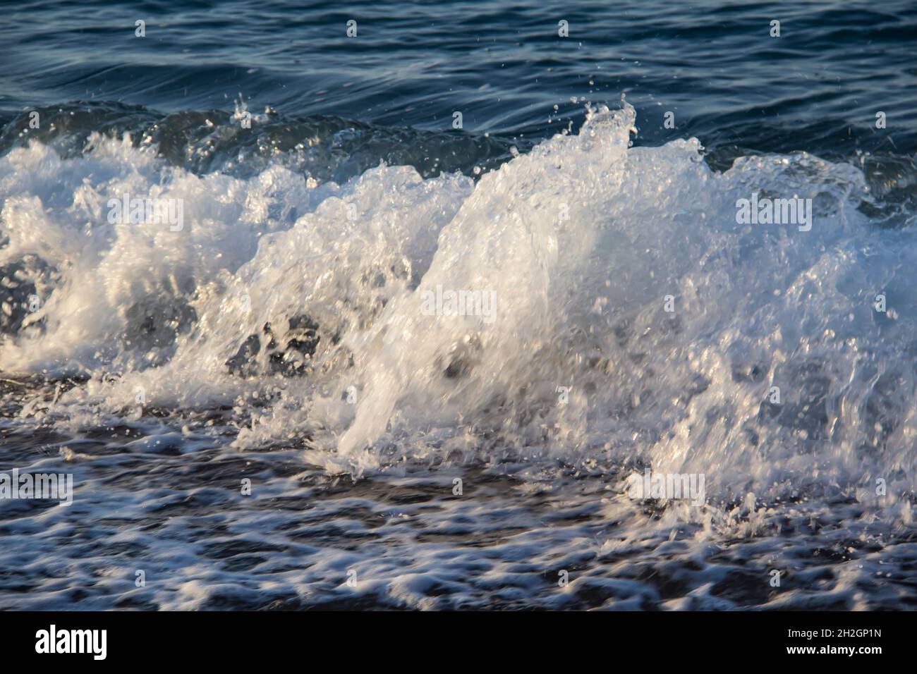 Beautiful seascape with sea waves and sand. Sea waves on the beach. Stock Photo