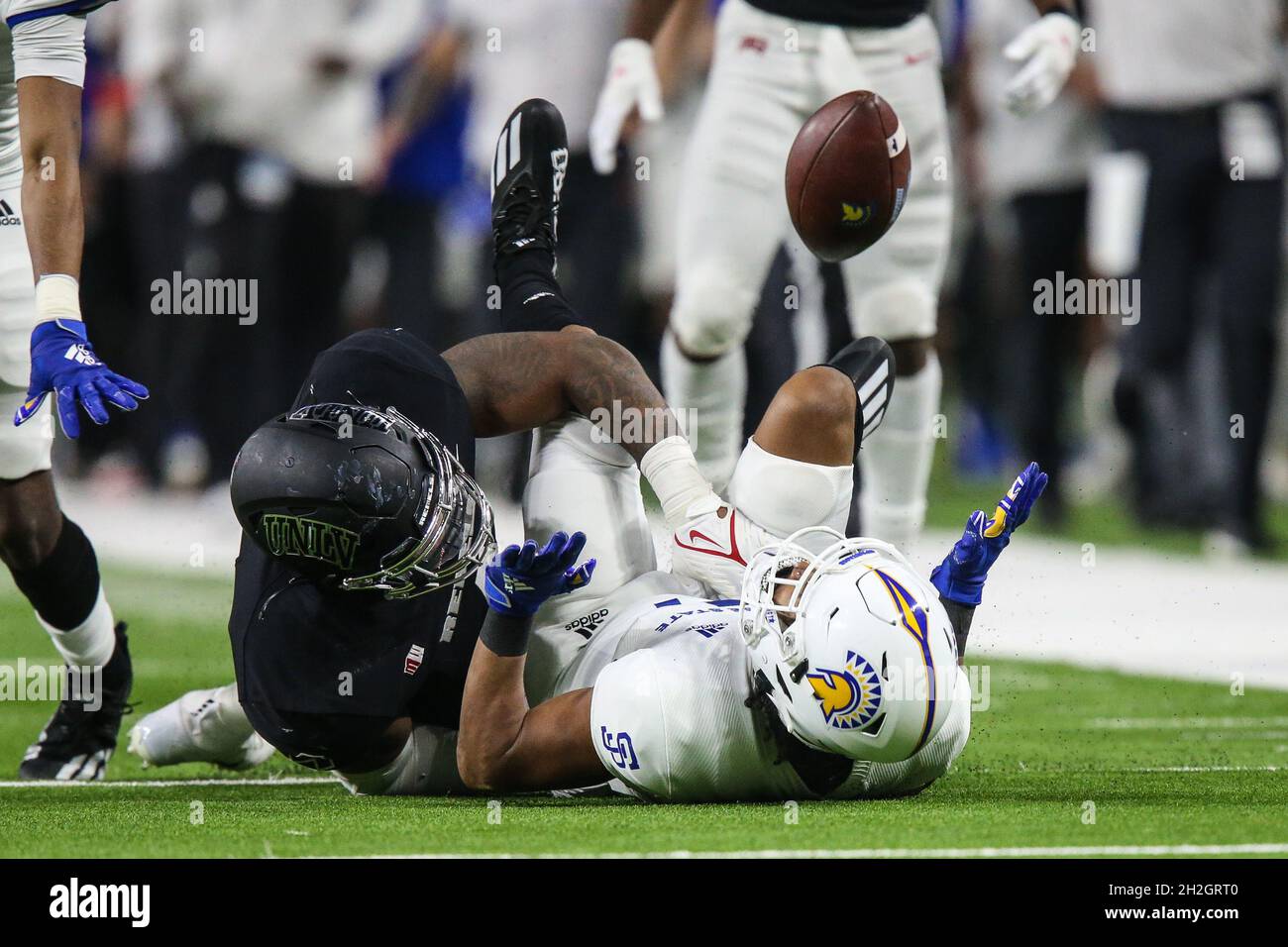 Las Vegas, NV, USA. 21st Oct, 2021. San Jose State Spartans wide receiver Isaiah Holiness (1) fumbles the ball during the NCAA football game featuring the San Jose State Spartans and the UNLV Rebels at Allegiant Stadium in Las Vegas, NV. The San Jose State Spartans defeated the UNLV Rebels 27 to 20. Christopher Trim/CSM/Alamy Live News Stock Photo