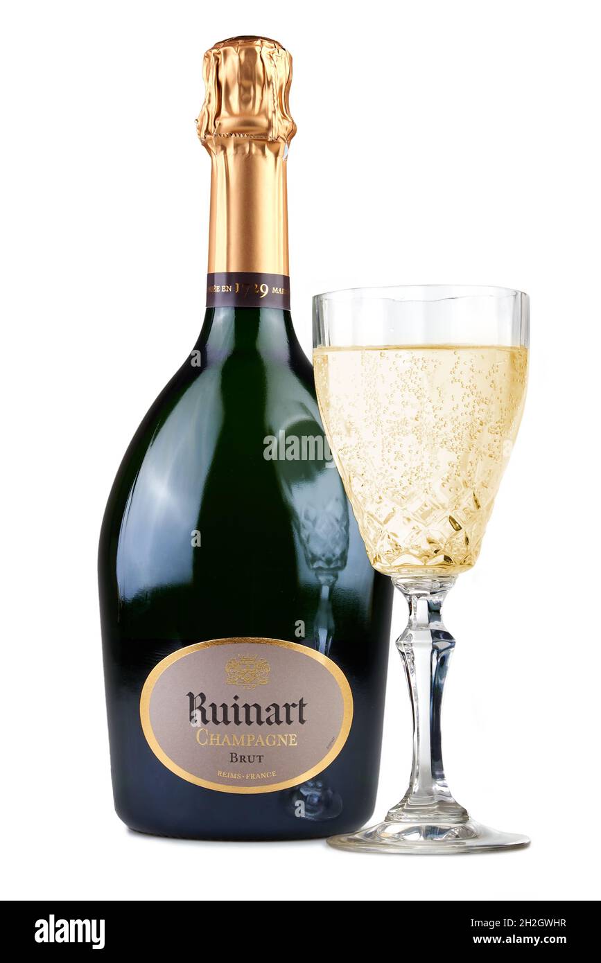 BRUSSELS, BELGIUM - NOVEMBER 25, 2020: Bottle of Champagne Ruinart and a filled glass. Isolated on white Stock Photo