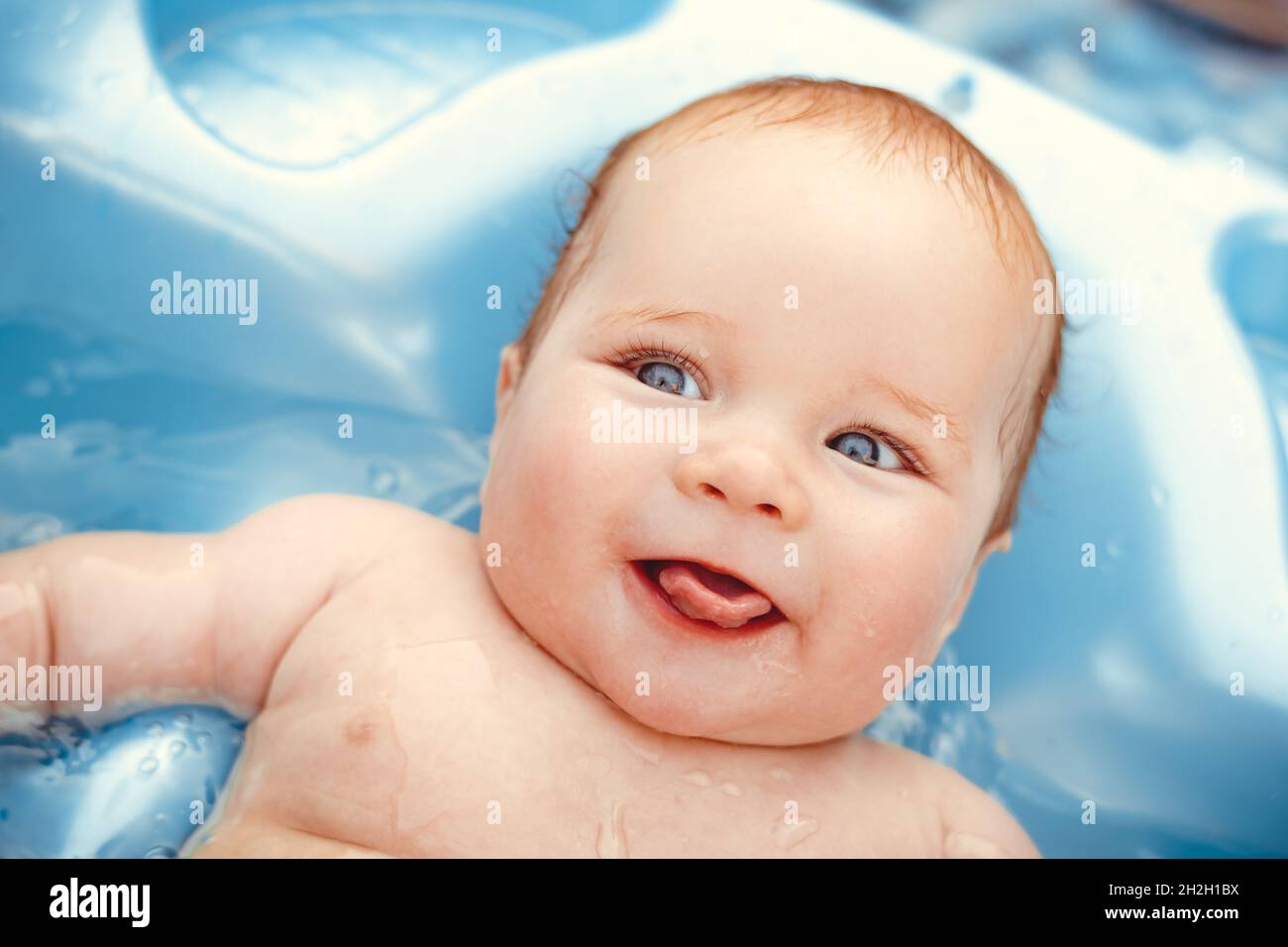 baby boy bathed in the outdoor tub Stock Photo Alamy