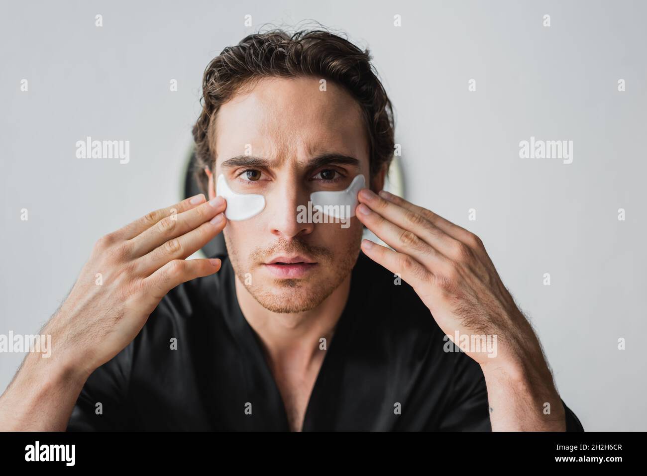 Smiling man eye patches hi-res stock photography and images - Alamy
