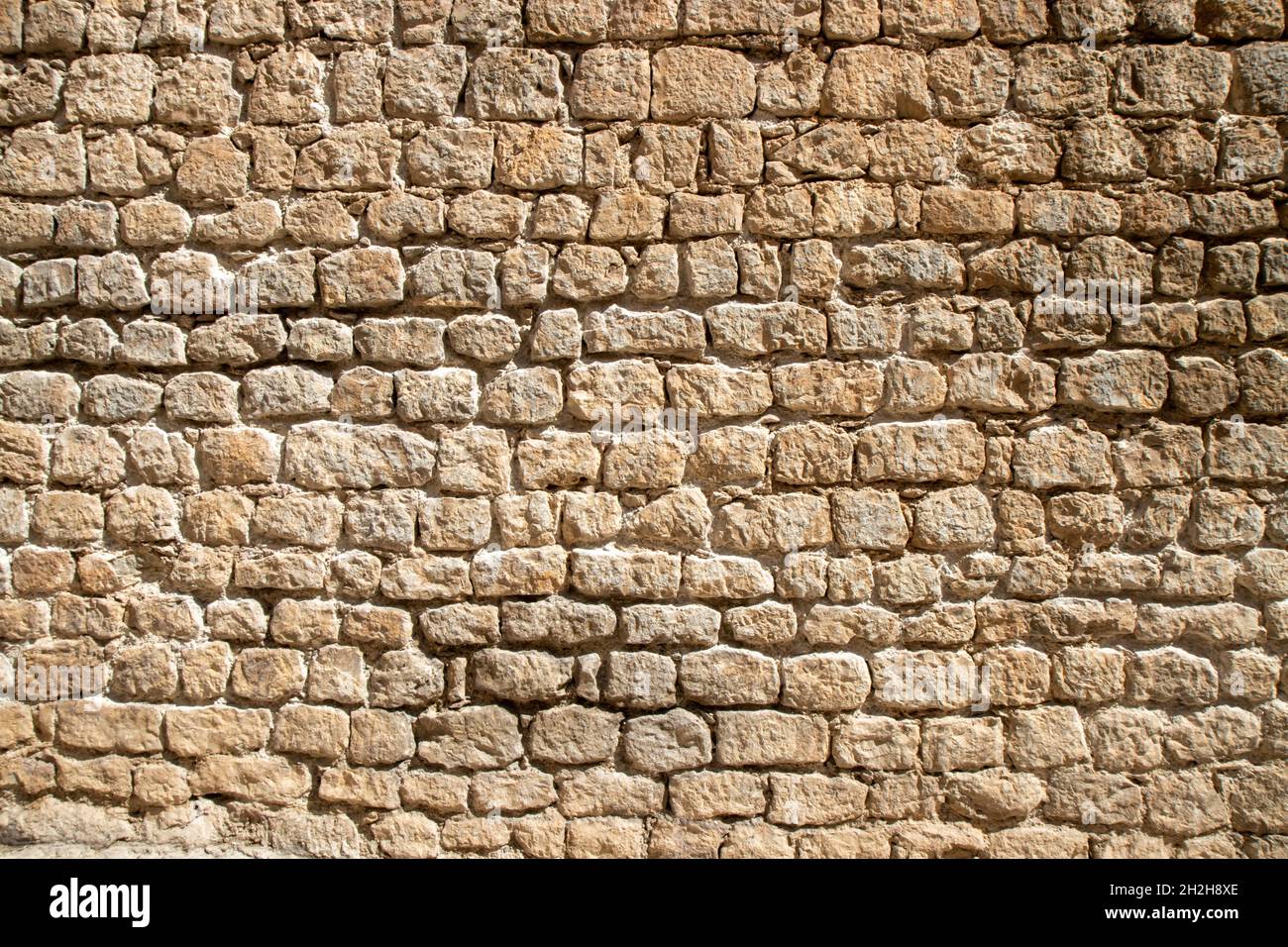 An old yellow brick wall brick texture Stock Photo