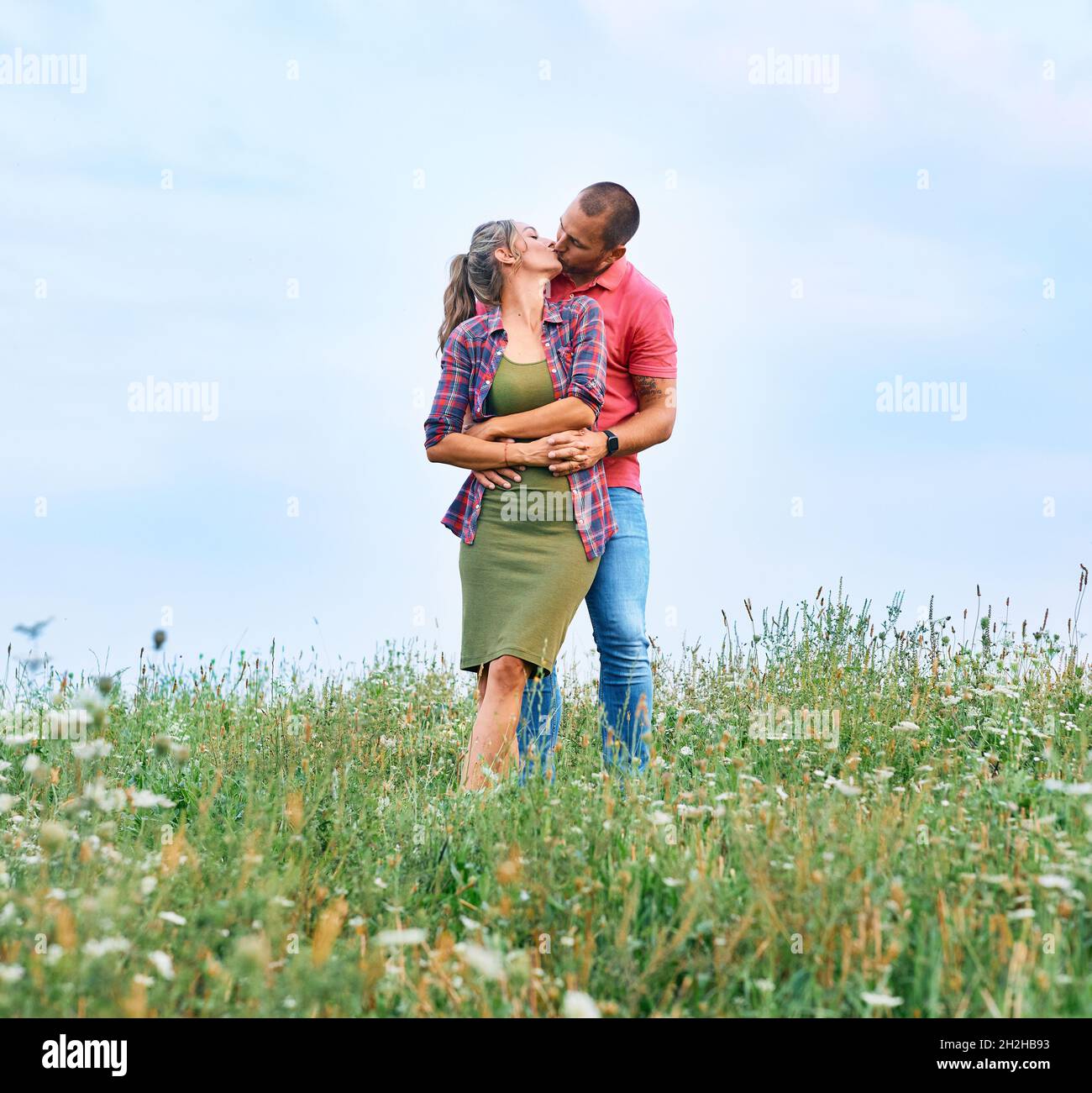 woman outdoor man couple lifestyle love nature happy summer together happiness kiss female male Stock Photo