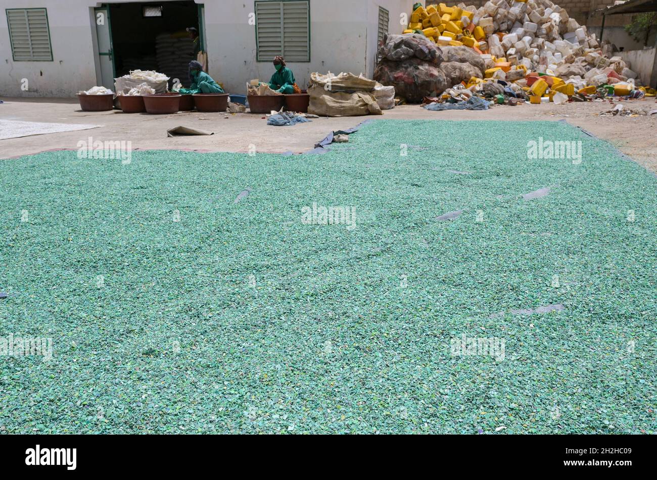 Senegal, Thies, plastic recycling from garbage, new granulate after processing / Plastik Recycling Unternehmen ProPlast Industrie, Plastik Granulat Stock Photo