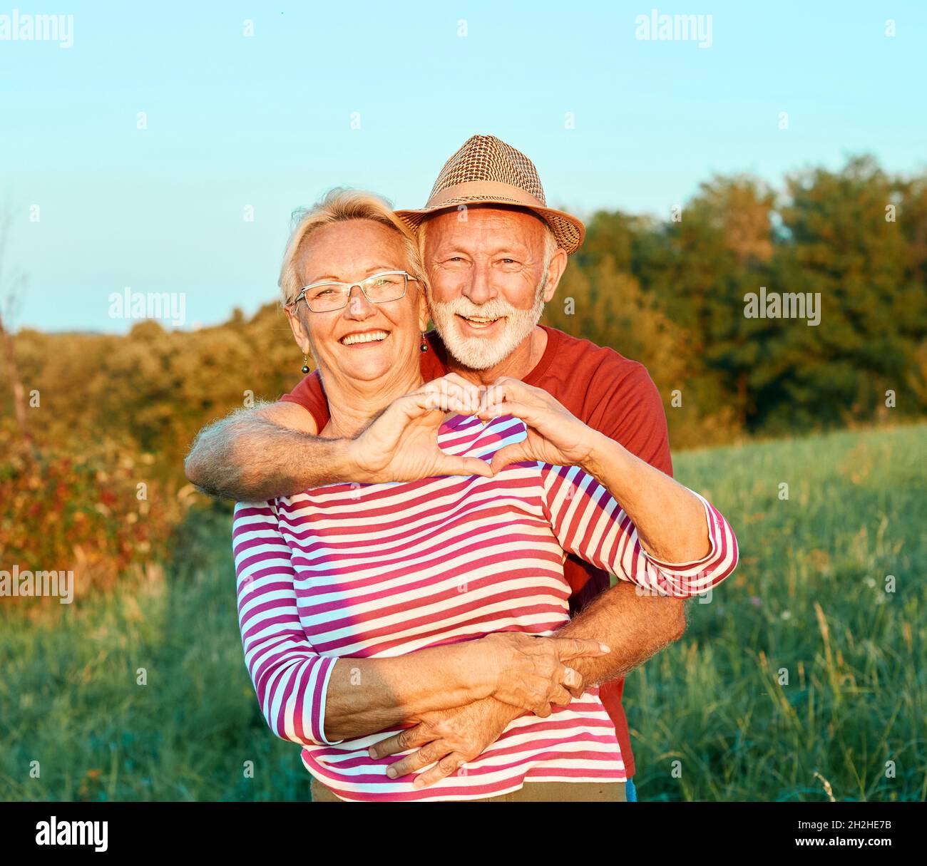 woman man outdoor senior couple happy lifestyle retirement together smiling love old nature mature Stock Photo