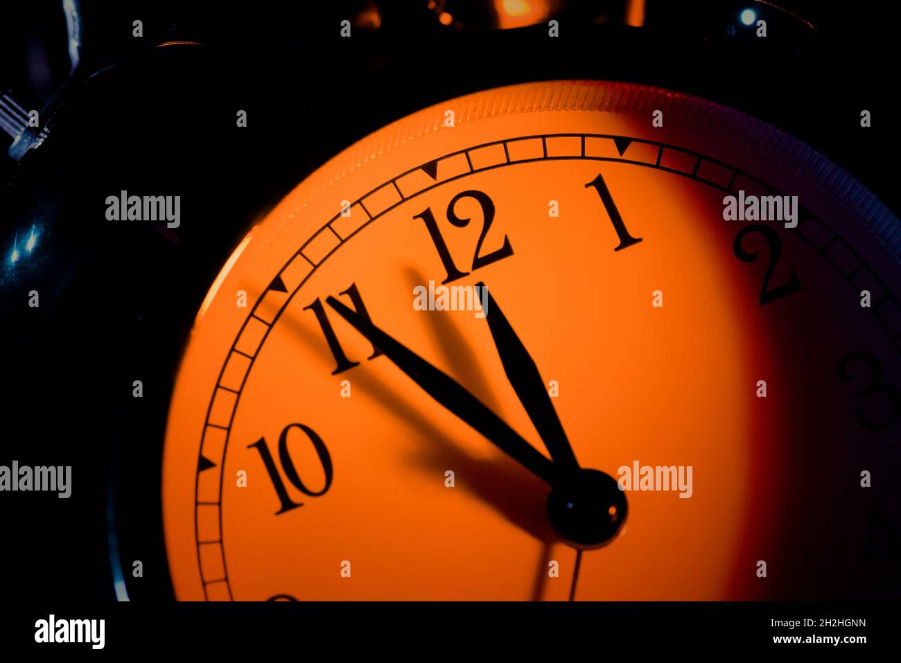 Five minutes to midnight. Changing the clocks, time adjustment