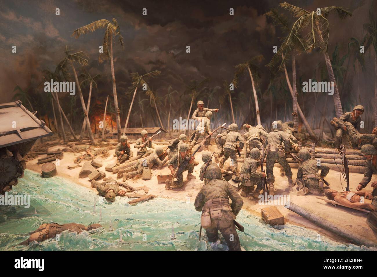 Soldiers landing on Red Beach on Betio island in the Tarawa atoll in the Pacific agasint the Japanese during WWII. At the National Museum of the Marin Stock Photo