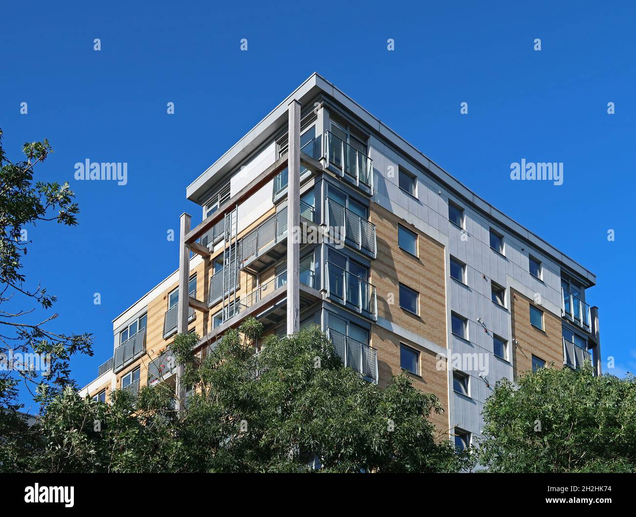 Galleria Court, Peckham, London. A private, multistorey apartment block with distinctive, external structural timber frames supporting the balconies Stock Photo