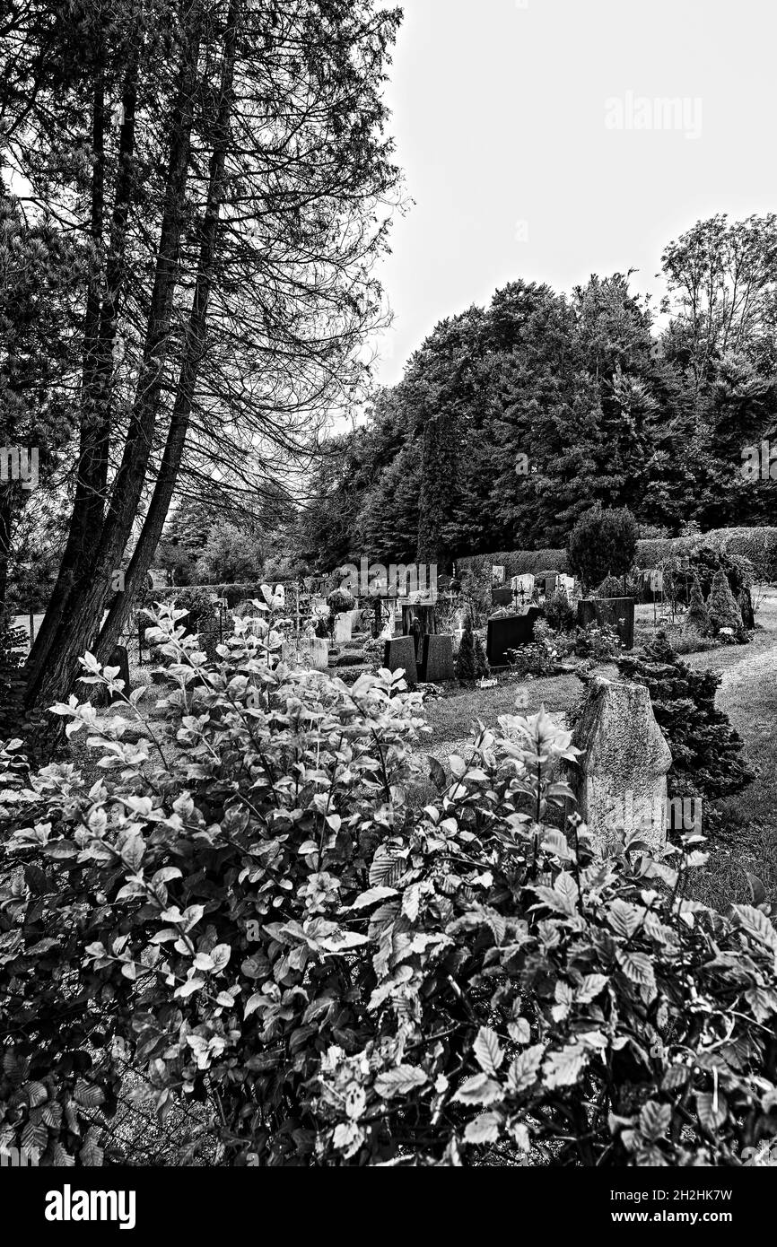 Upper Bavaria - Christian cemetery in rural environment in black and white   Oberbayrischer christlicher Friedhof in bäuerlicher Umgebung Stock Photo