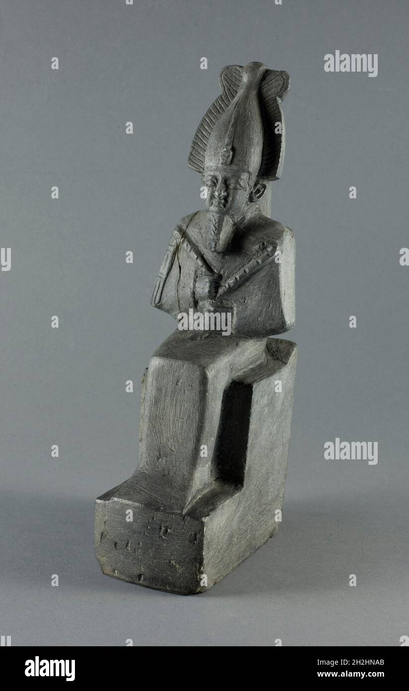 Statuette of the God Osiris Seated, Egypt, Late Period, Dynasty 26-31 (664-332 BCE). Stock Photo