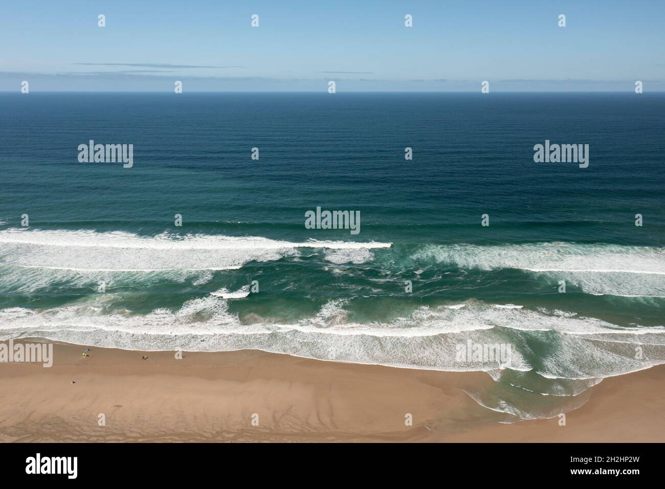 Aerial view of waves on the coast at Porthtowan beach north Cornwall UK Stock Photo