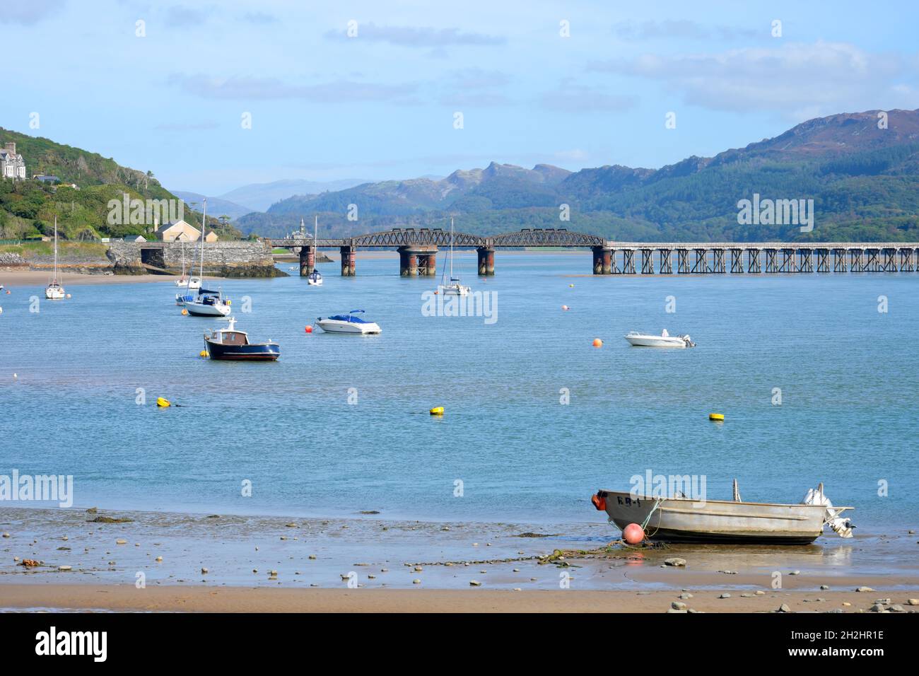 Boats at Barmouth & the famous Barmouth railway bridge Barmouth Gwynedd