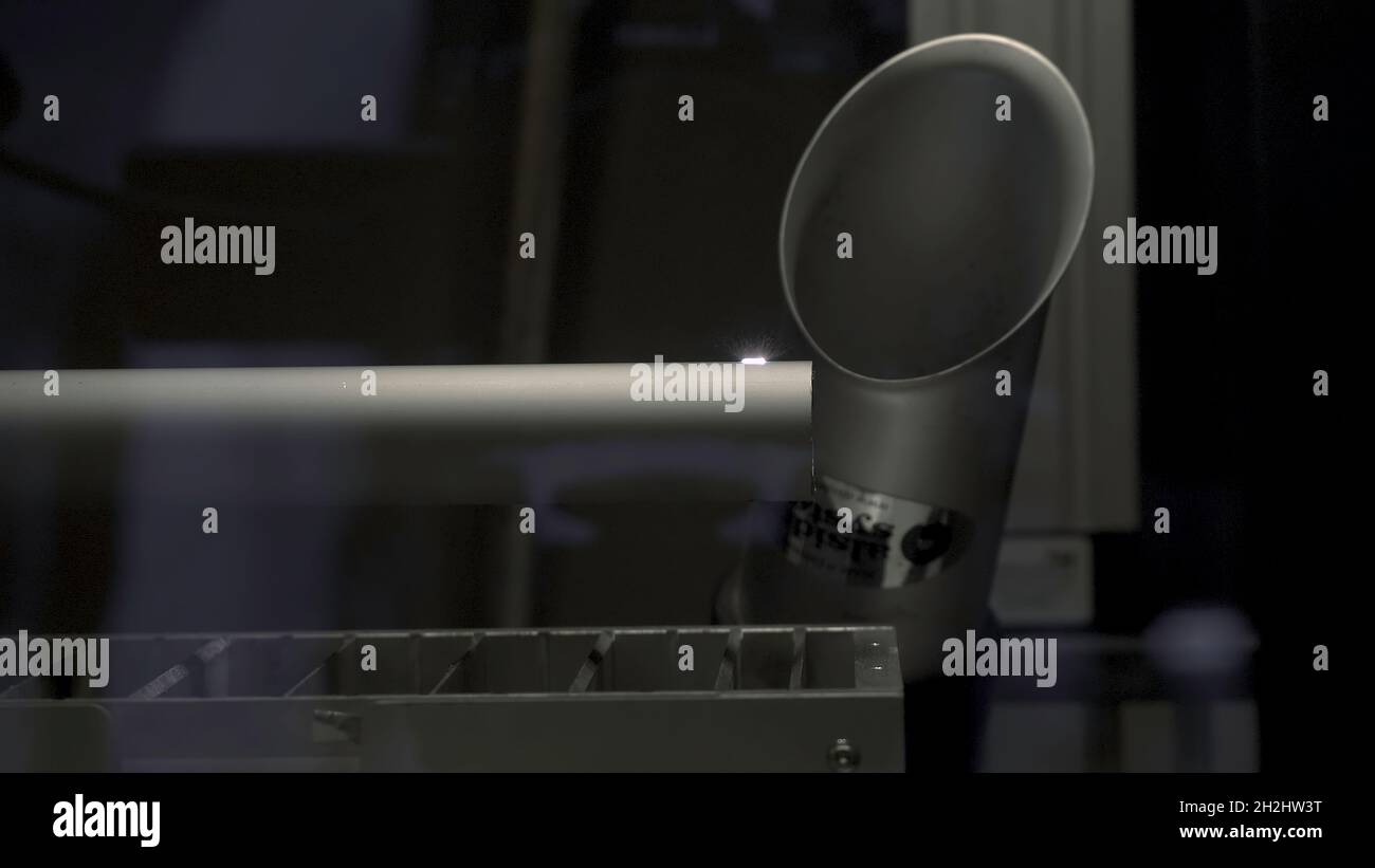 Exhaust pipe from industrial device. HDR. Modern pipe for exhaust gases in cars or production