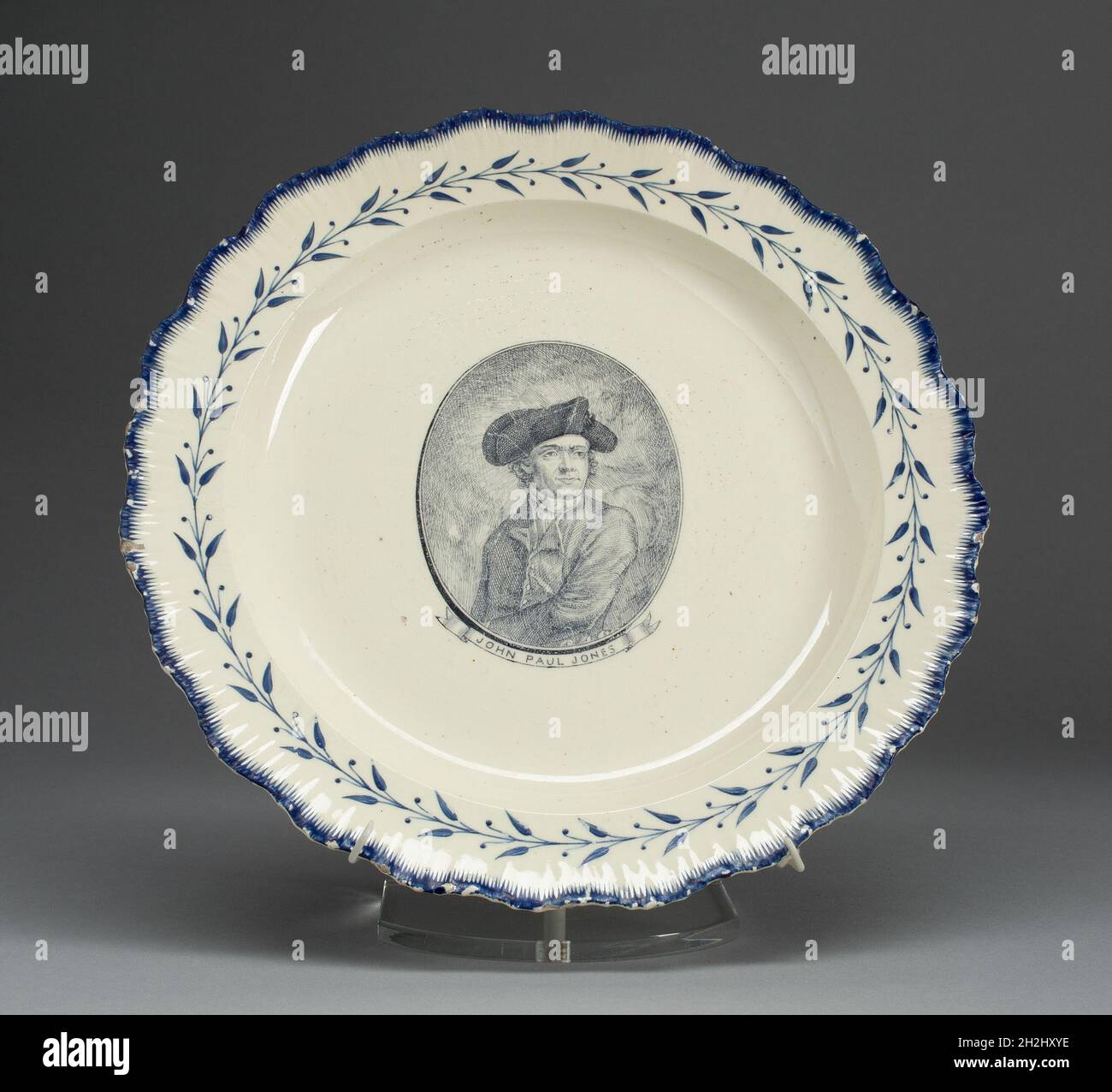 Plate, c. 1790. Stylised floral decoration with portrait of John Paul Jones. Made in Leeds, England, for the American market. Stock Photo