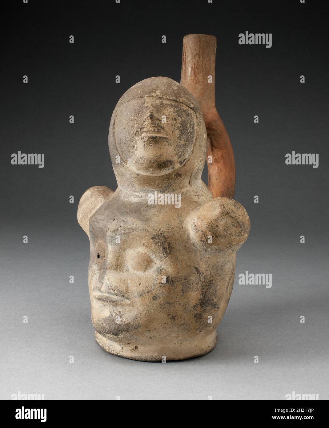 Handle Spout Vessel in the Form of Composite Human Heads with Physical Deformaties, 100 B.C./A.D. 500. Stock Photo