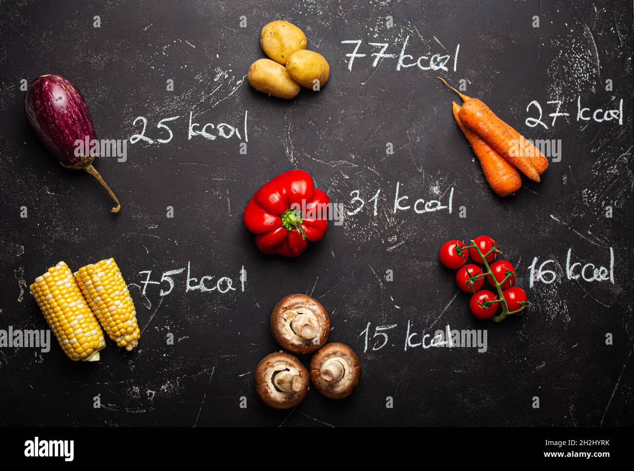 Vegetables and calorie counting top view Stock Photo Alamy