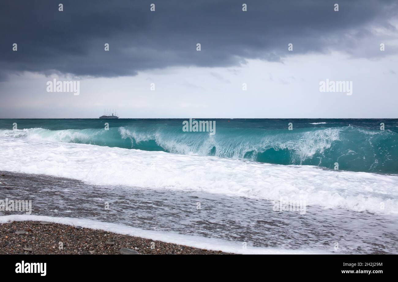 Mediterranean sea with stormy weather and big waves. Wave breaking on