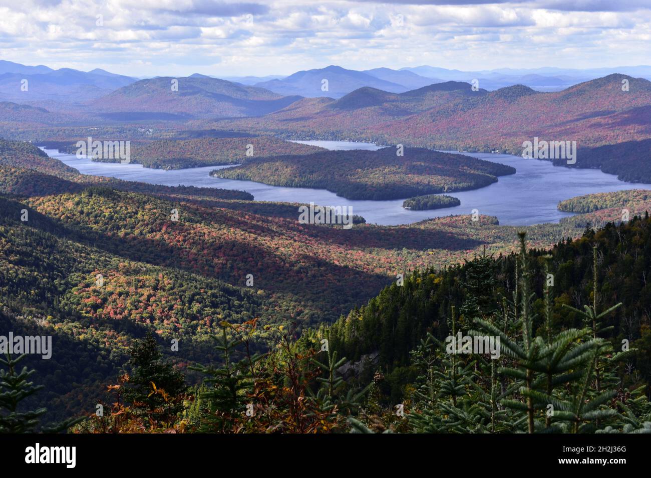 Aerial view of Lake Placid from top of Whiteface Mountain in the Adirondacks of New York U.S.A. with Autumn Colored Foliage Stock Photo