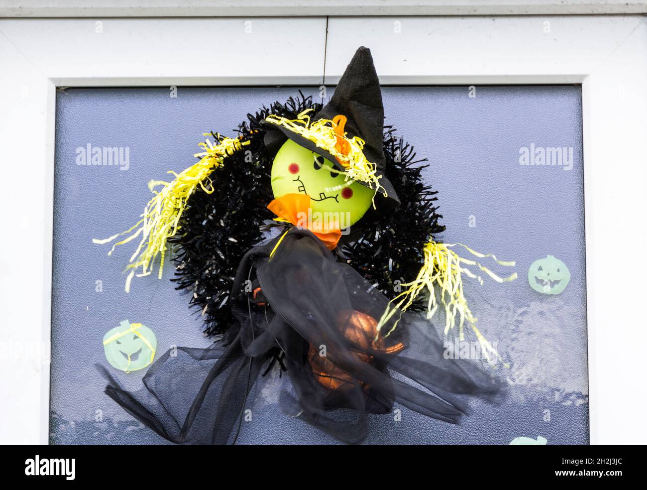 Happy Halloween decoration on front door. Stock Photo