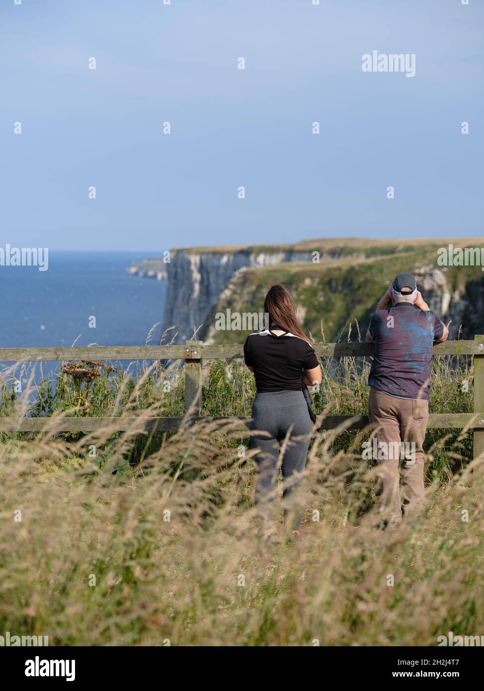 Nature Lovers - Ornitholigists - Birdwatchers - Birdwatching - Birdspotting - Twitchers - at Bempton Cliffs East Riding of Yorkshire England UK Stock Photo