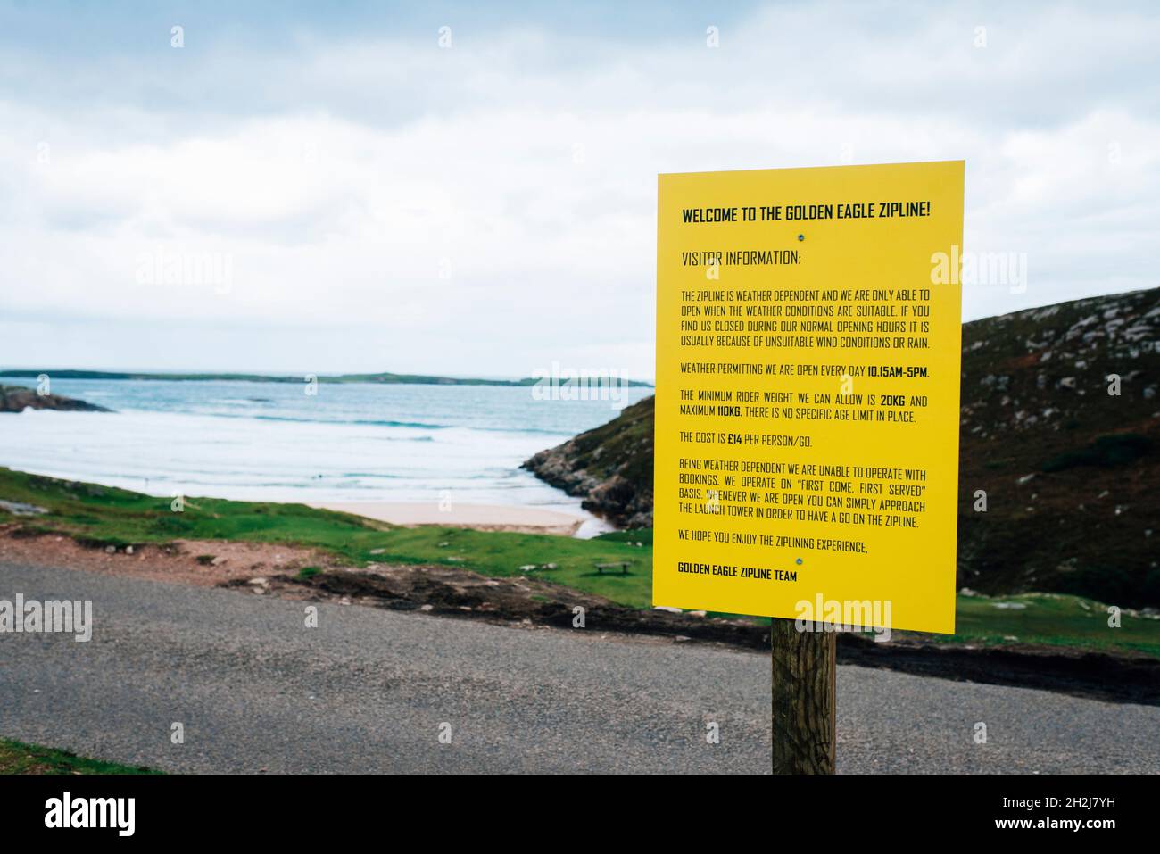 sign for the golden eagle zip line on CEANNABEINNE BEACH in scotland along the nc500 road trip route Stock Photo