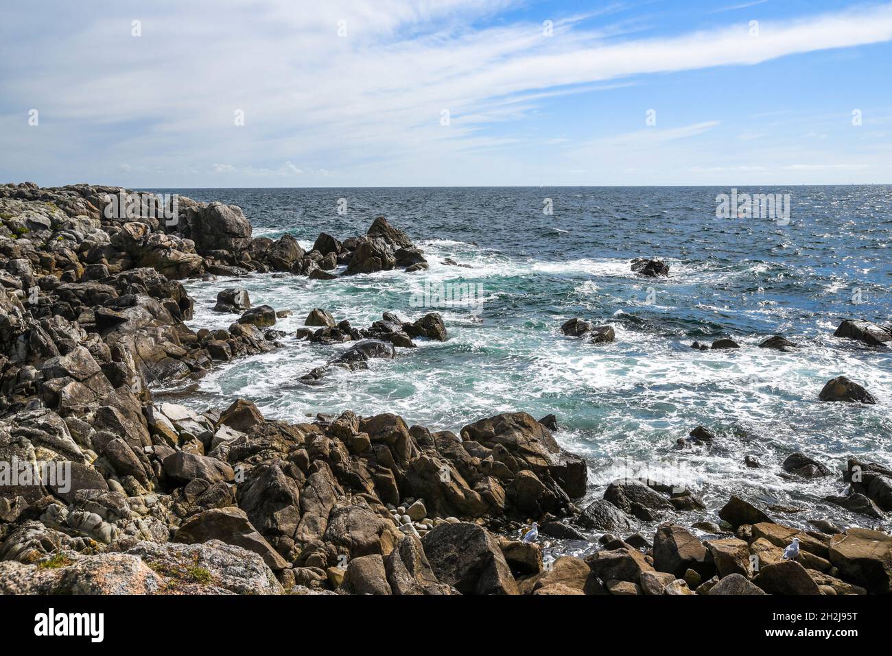Rocky coast at the Atlantic Ocean in France landscape. Selective focus ...
