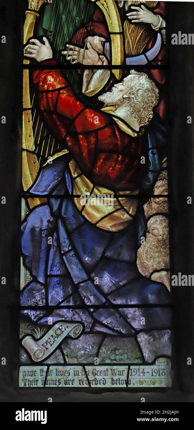 A stained glass window by Percy Bacon depicting Peace, St Peter's Church, Dunchurch, Warwickshire Stock Photo