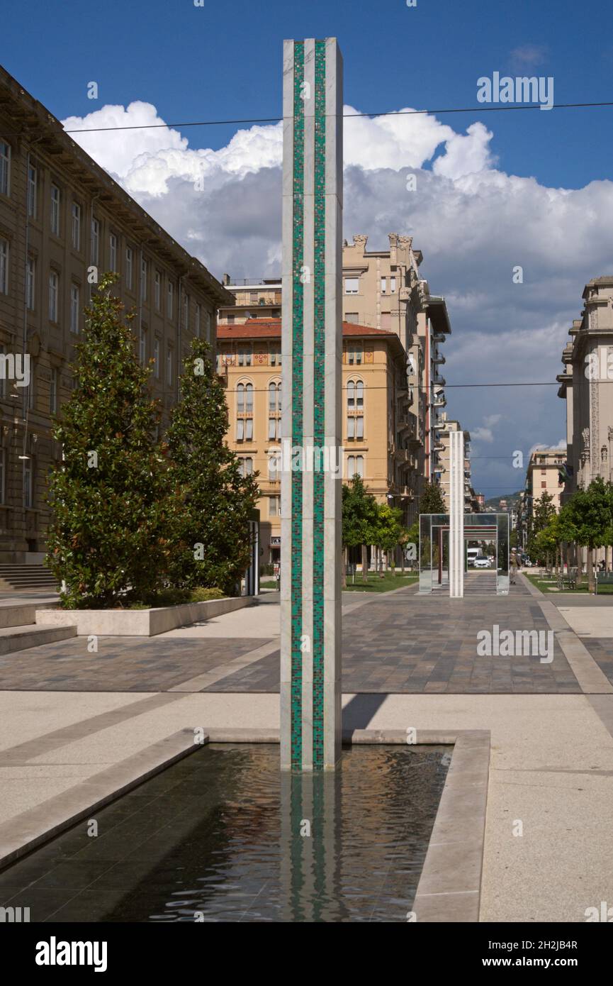 columns artworks by Daniel Buren in piazza Verdi, La Spezia, Liguria, Italy Stock Photo