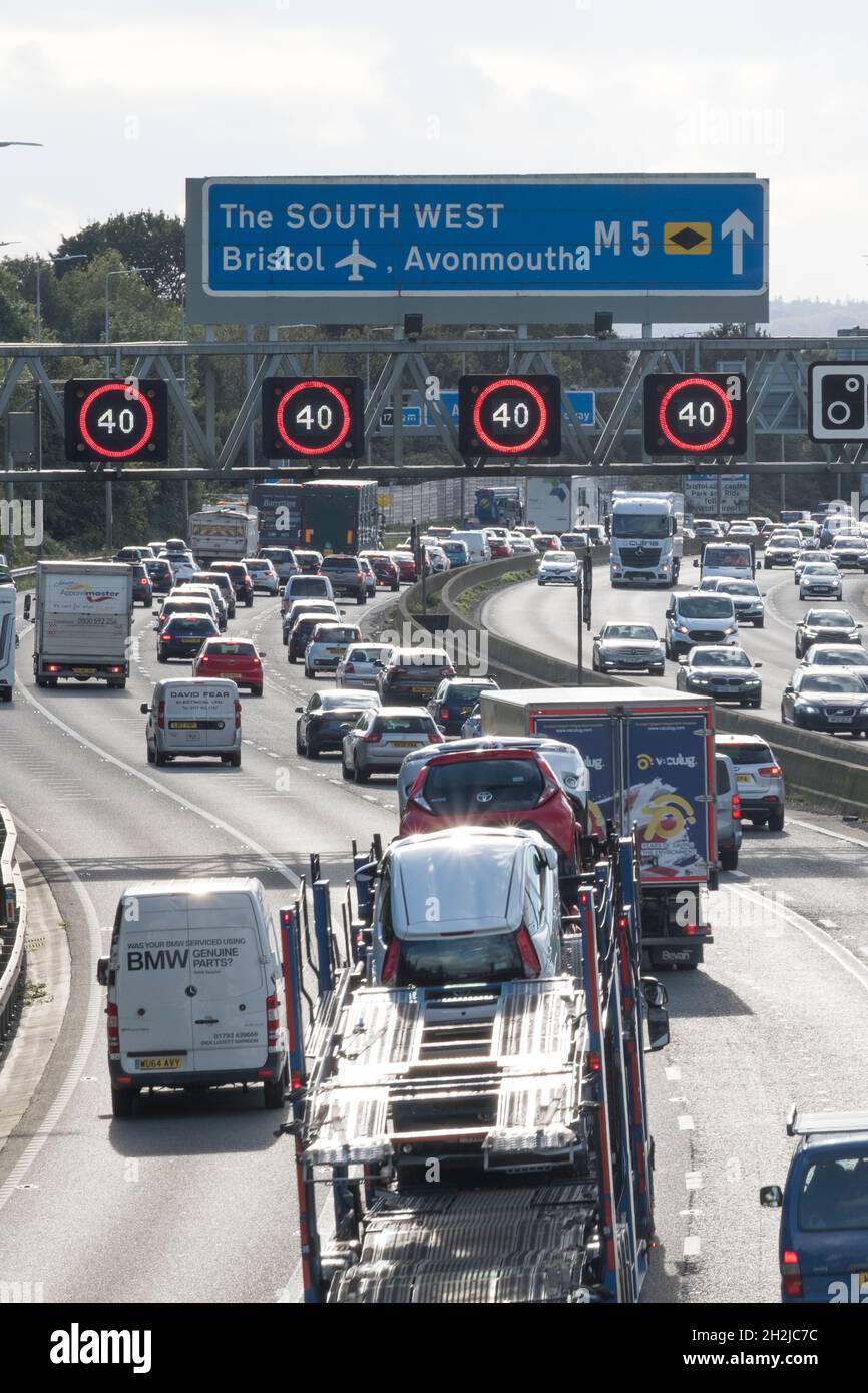 Bristol, UK. 22nd Oct, 2021. School holidays bring congestion on the M5 motorway. Speed restrictions are in place on the M5 motorway at Filton due to the volume of traffic heading south towards Devon and Cornwall. Highways England report average speeds around 40 MPH. Credit: JMF News/Alamy Live News Stock Photo