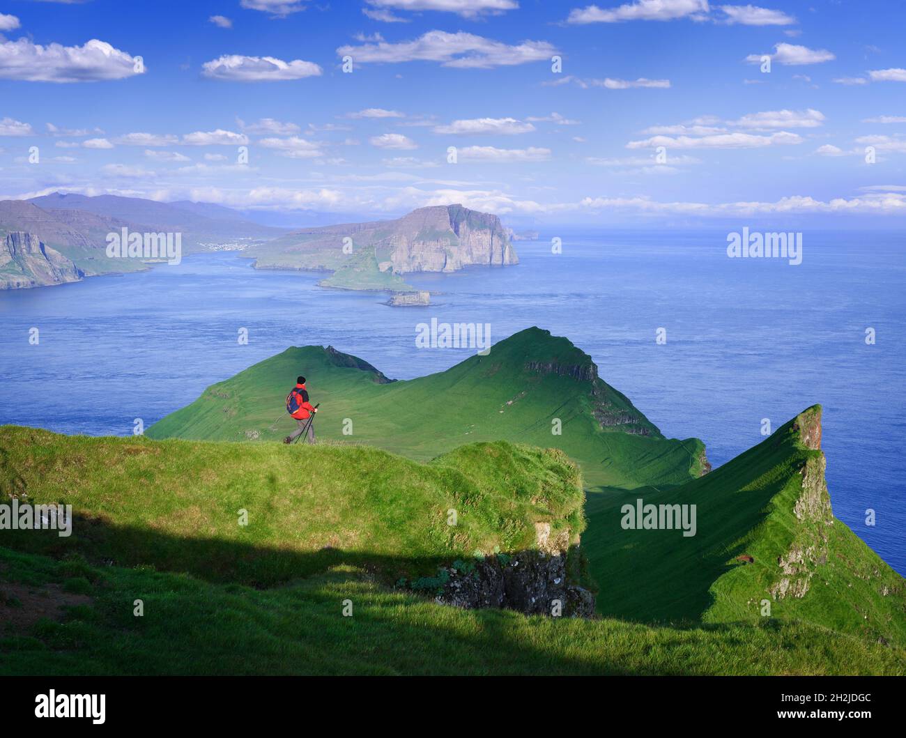 Hiking On Mykines Island Overlooking The Vagar And Tindholmur Faroe 