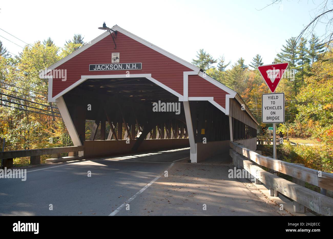 The Honeymoon Covered Bridge in Jackson, NH. USA.  Built in 1876. It crosses the Ellis River Stock Photo