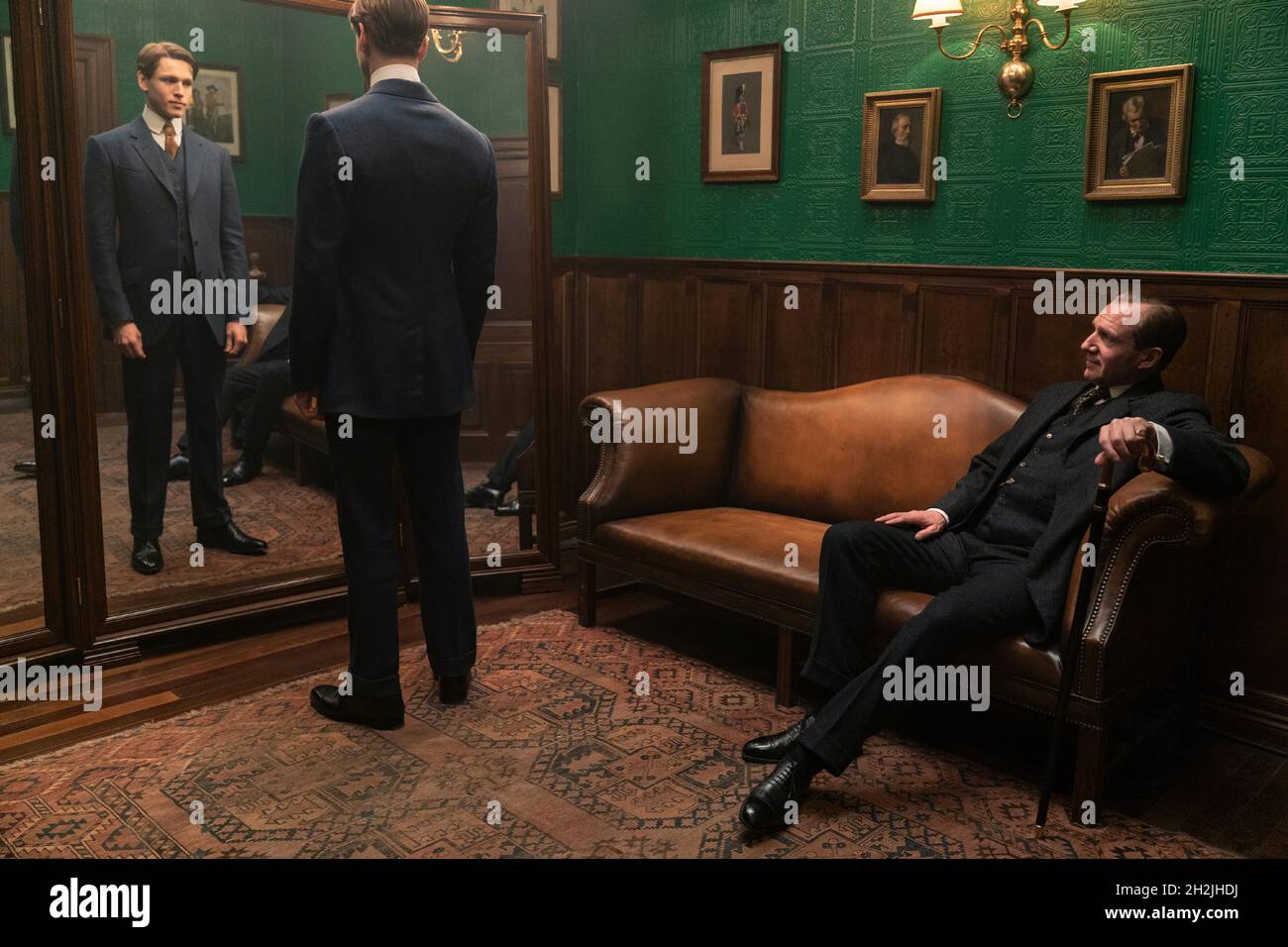 Harris Dickinson as Conrad and Ralph Fiennes as Oxford in 20th Century