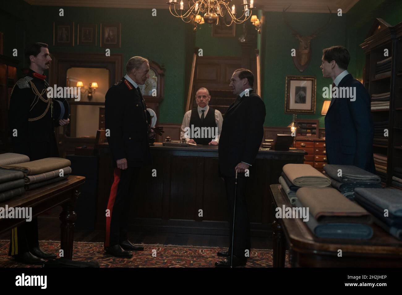 (L-R) Matthew Goode as Morton, Charles Dance as Kitchener, Shaun Scott as Kingsman Tailor, Ralph Fiennes as Oxford and Harris Dickinson as Conrad in 20th Century Studios’ THE KING’S MAN. Photo credit: Peter Mountain / 20th Century Studios / The Hollywood Archive Stock Photo
