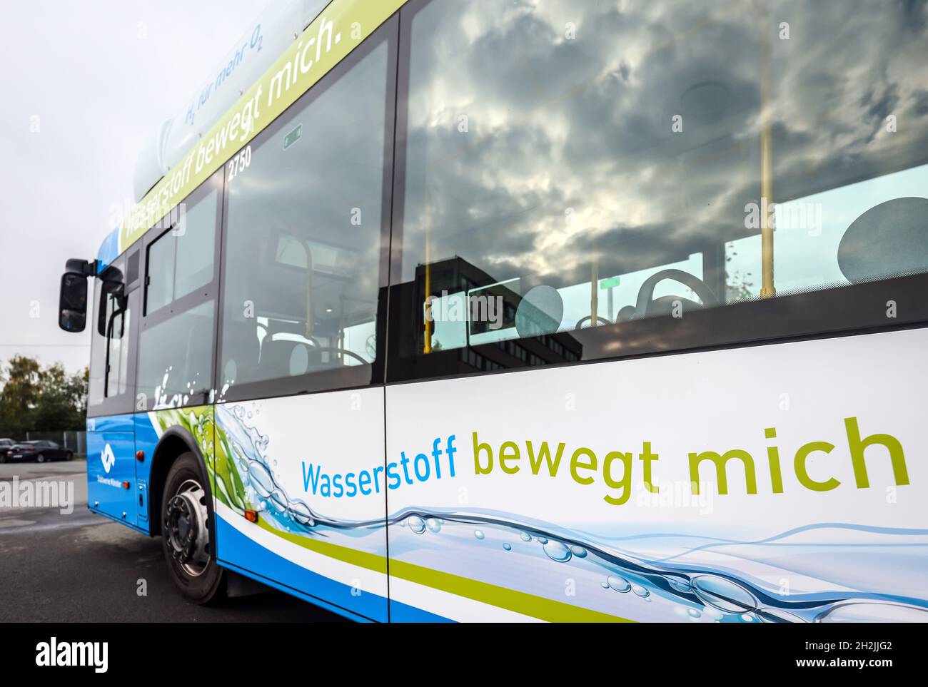 Muenster, North Rhine-Westphalia, Germany Hydrogen bus in regular service refuels H2 hydrogen at a mobile H2 hydrogen refueling station. Stock Photo