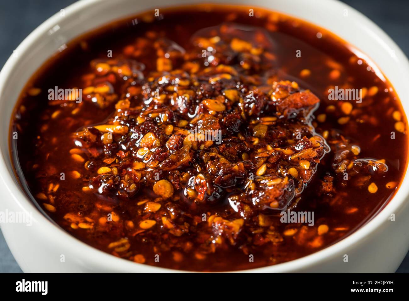 Homemade Spicy Red Asian Chili Crunch Spice with Oil and Garlic Stock