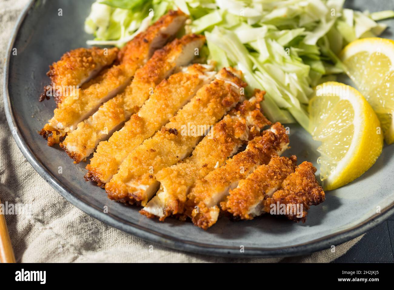 Homemade Japanese Chicken Katsu with Cabbage and Lemon Stock Photo Alamy