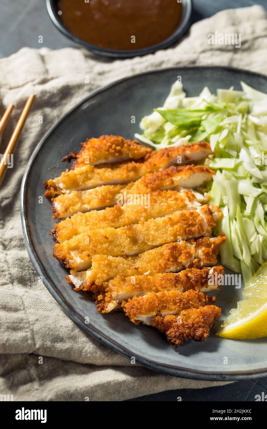 Homemade Japanese Chicken Katsu with Cabbage and Lemon Stock Photo Alamy