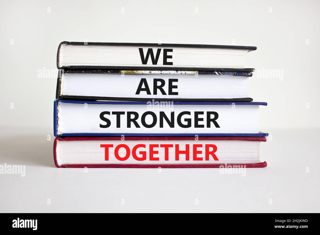 Stronger together symbol. Books with words 'we are stronger together