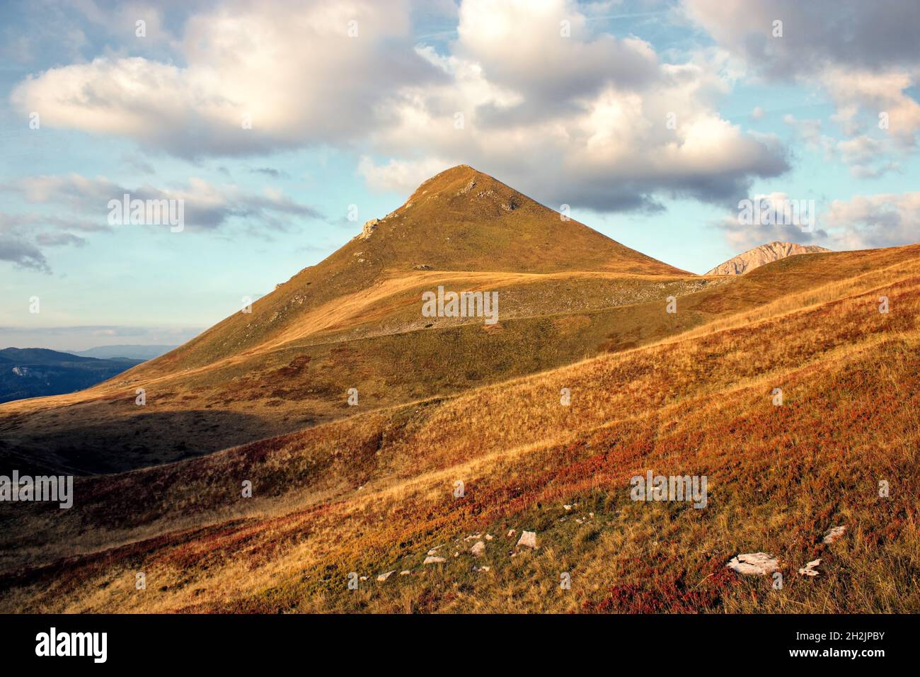 Beautiful landscape of mountains under the blue cloudy sky Stock Photo ...