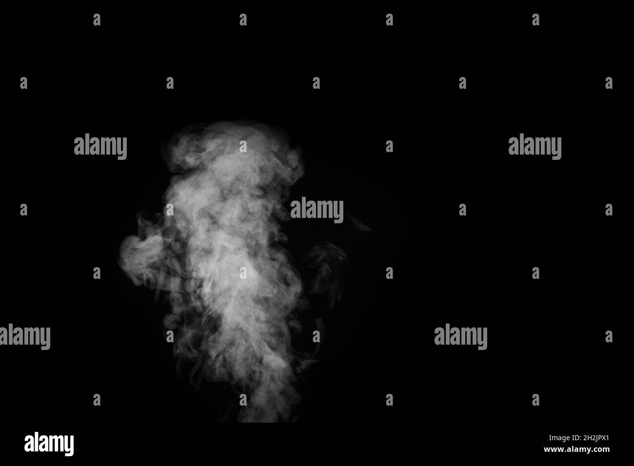 A white fumes, smoke on a black background to add to your pictures. Perfect smoke, steam, fragrance, incense for your photos. Stock Photo