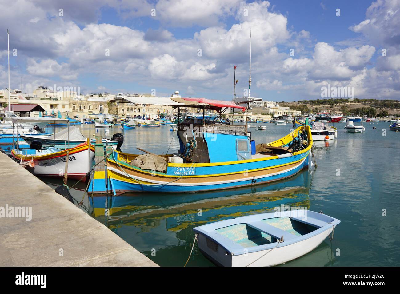 Fishing boats of Marsaxlokk, Gozo, Malta. Photo by Willy Matheisl Stock Photo