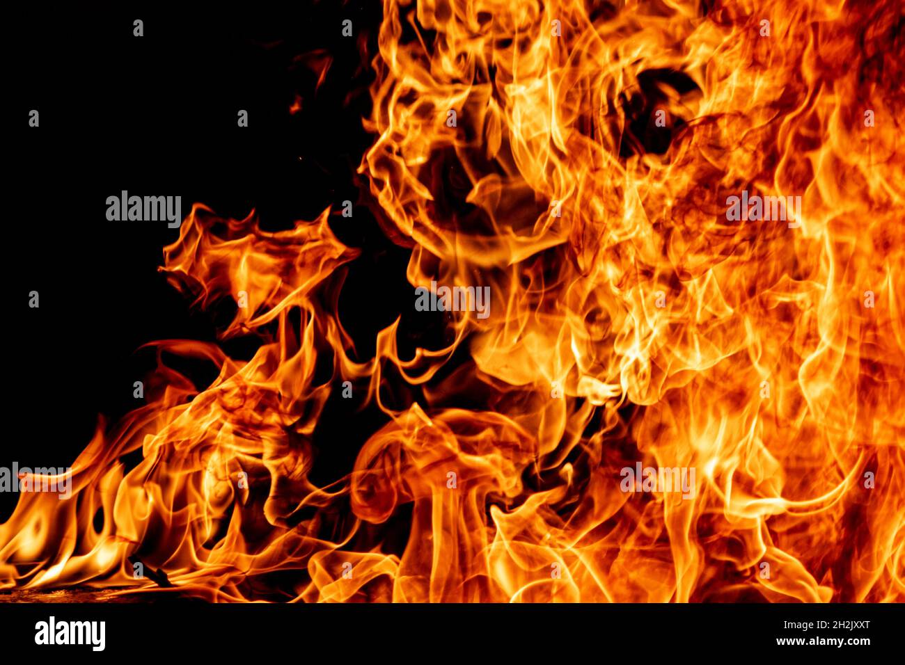 Fire flame texture. Burning material backdrop. Burn effect pattern