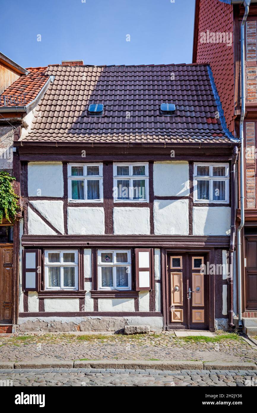 Street with old timber framing house in Quedlinburg, Germany Stock Photo
