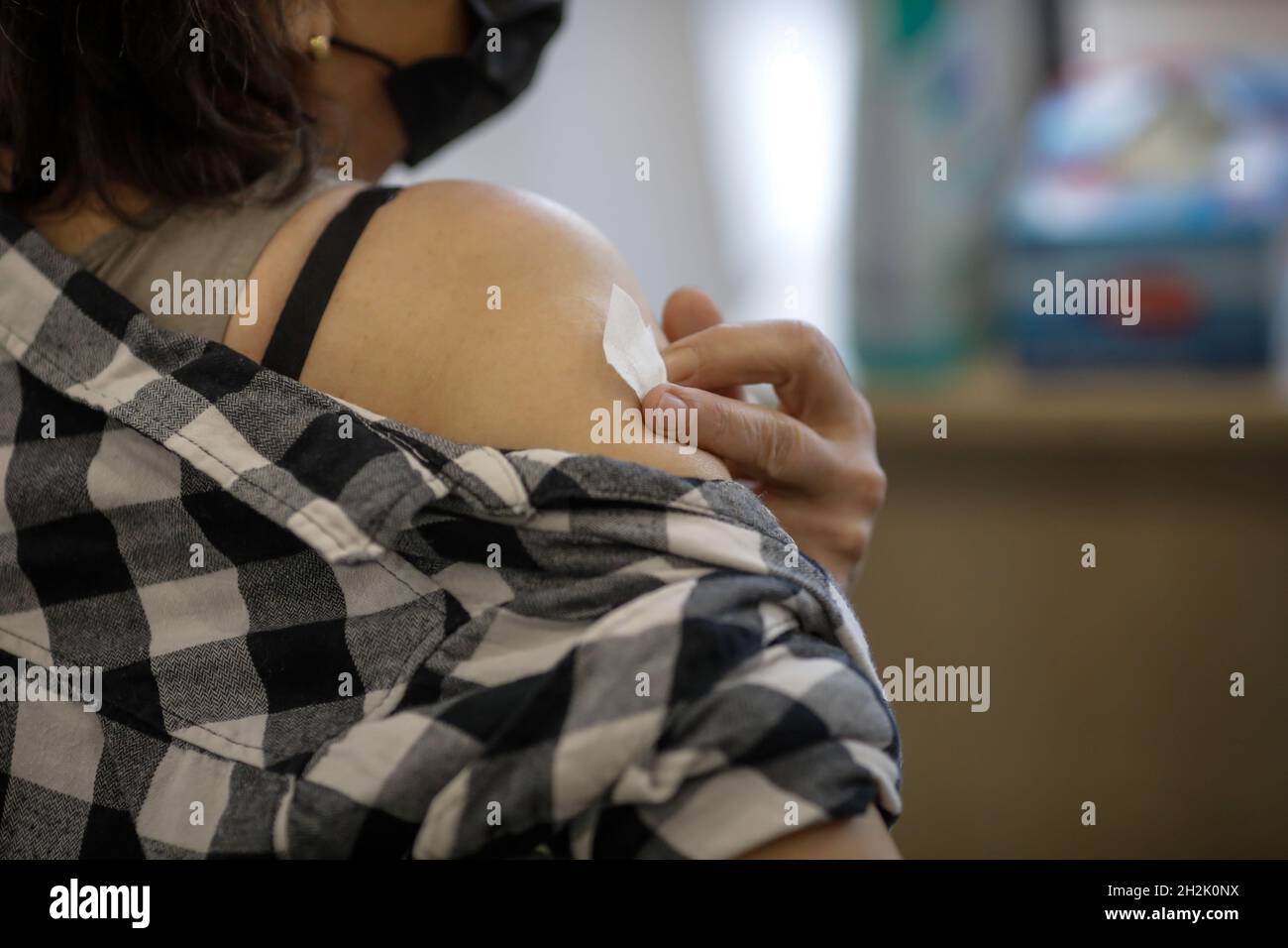 Bucharest, Romania - October 22, 2021: Details with a person getting the Sars Cov 2 (Covid-19) vaccine. Stock Photo