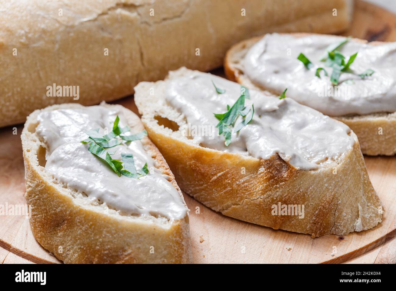 anchovy spread on white baguette Stock Photo Alamy