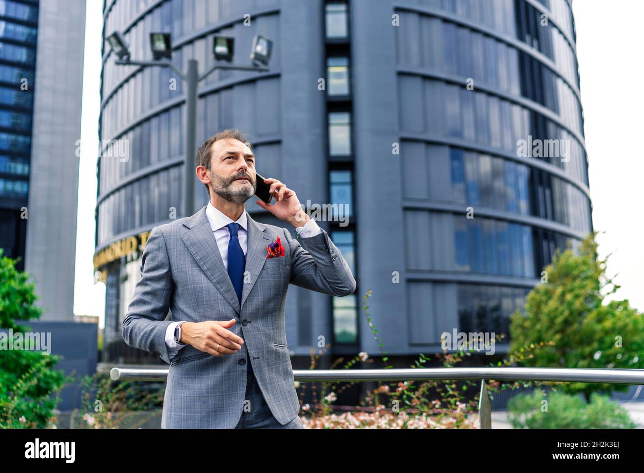 executive having a business phone conversation Stock Photo