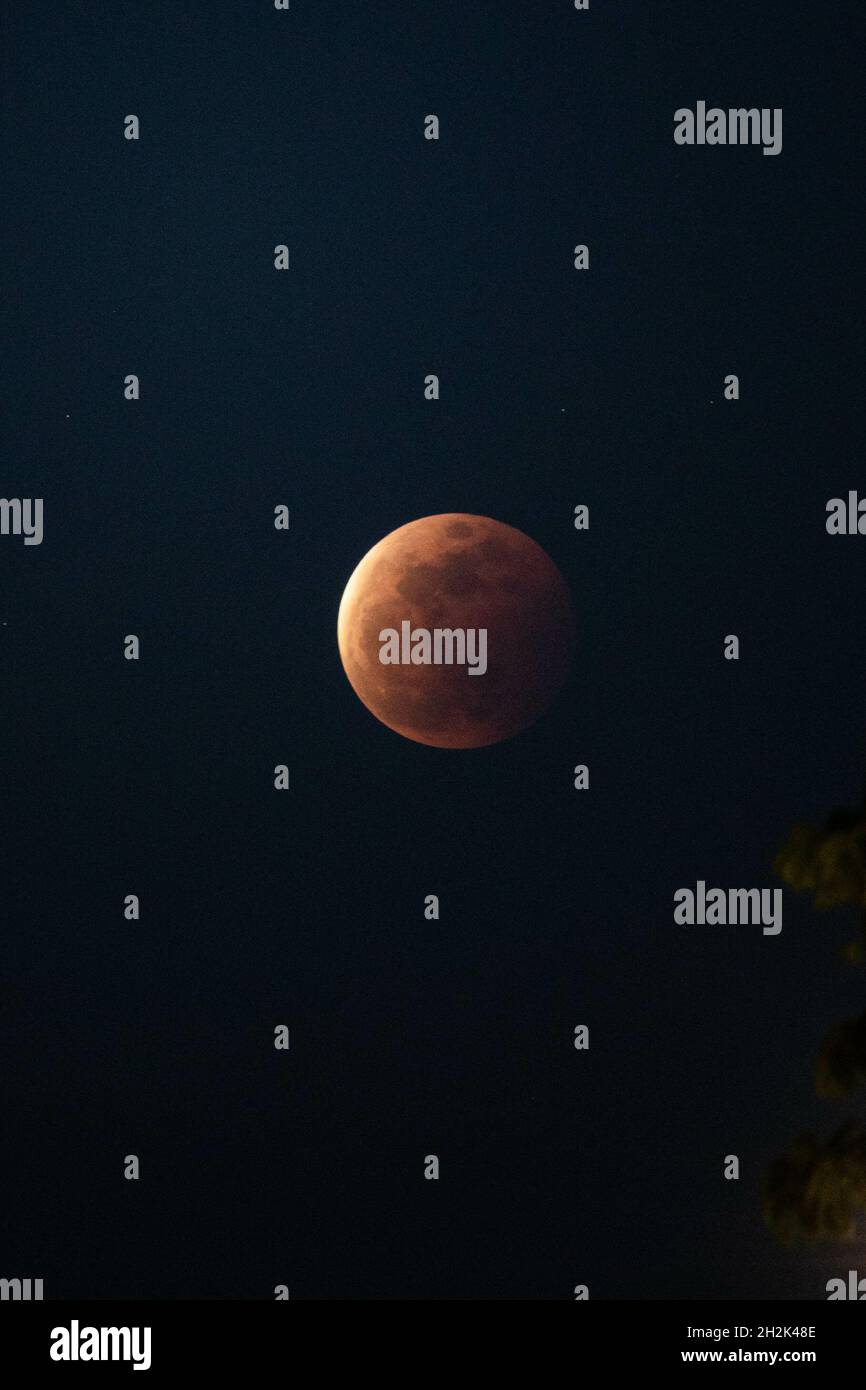 Full moon on a dark sky at night Stock Photo - Alamy