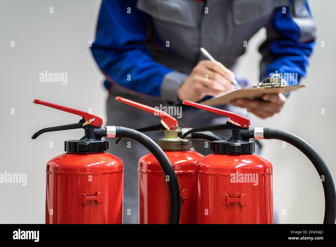 Fire Extinguisher Safety Prevention Check. Emergency Equipment