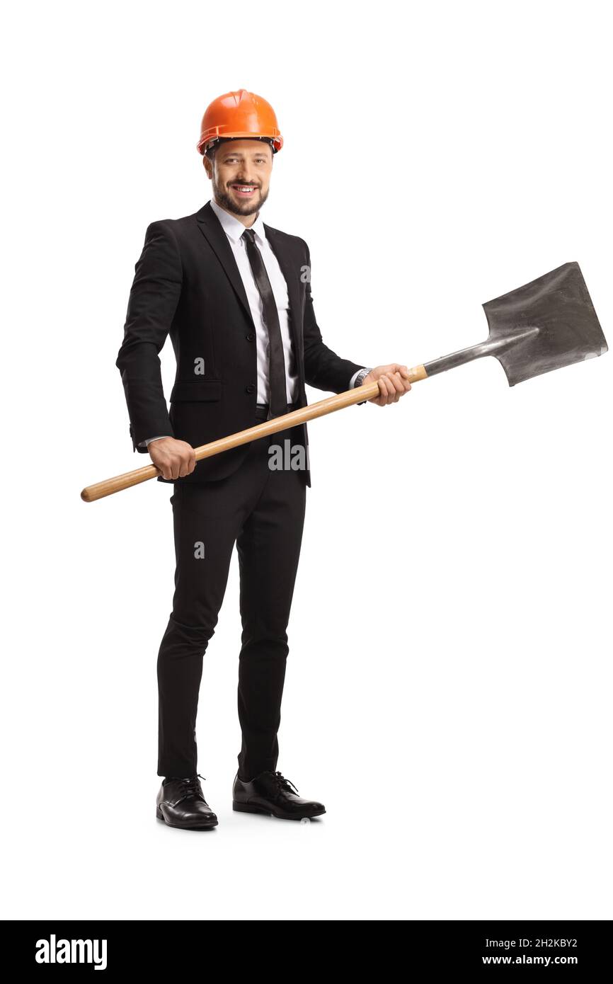 Full length portrait of a businessman investor with a hardhat holding a shovel isolated on white background Stock Photo